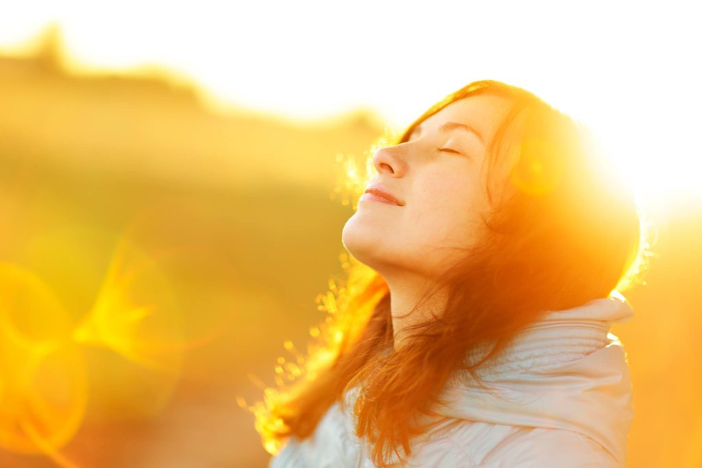 Women experiencing radiant heating via the Sun.