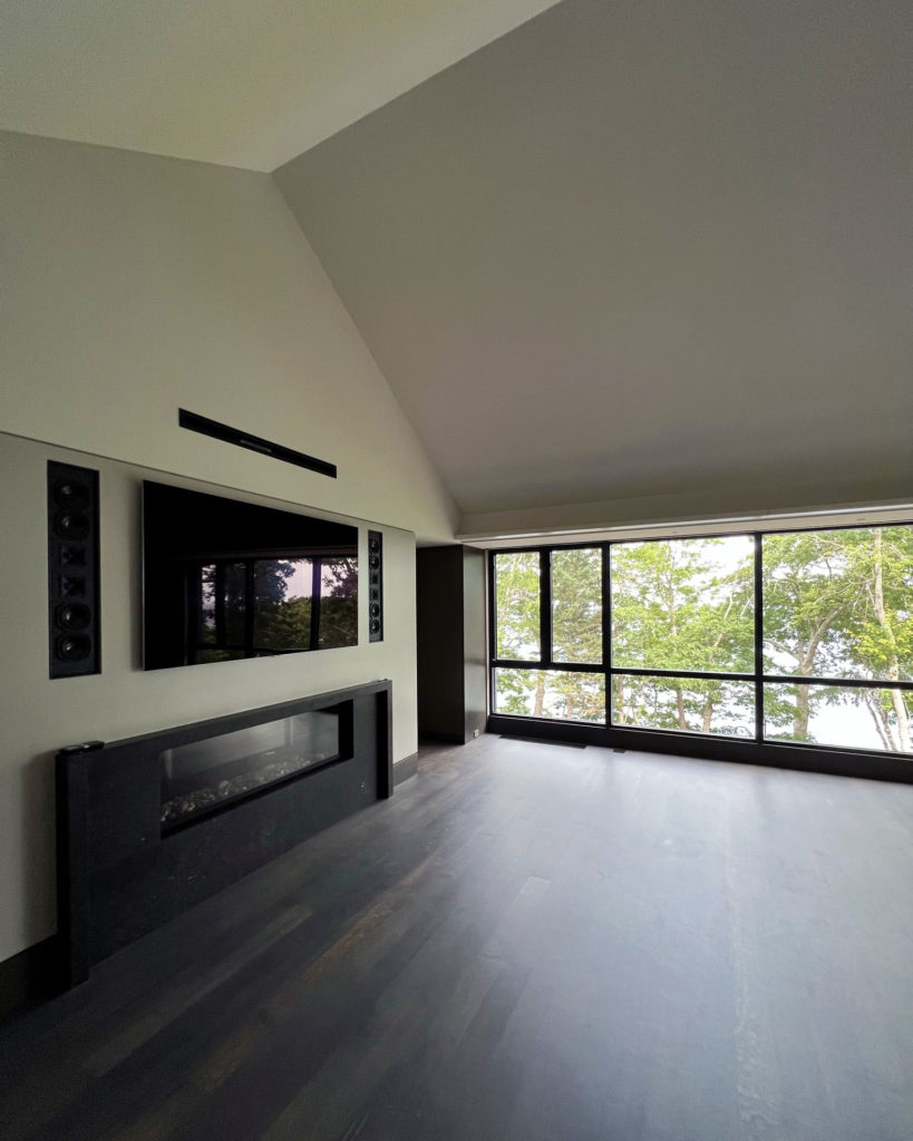 Living room that utilizes radiant heating and cooling.