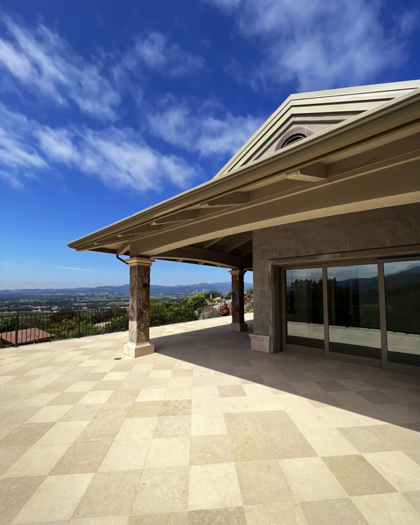 Exterior of home and guest house that utilize a radiant ceiling system for heating and cooling.