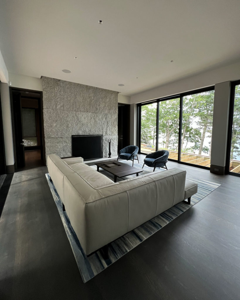 Living room that utilizes radiant heating and cooling.