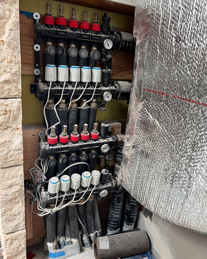A Messana modular manifold used to supply heated and chilled water to a radiant floor.