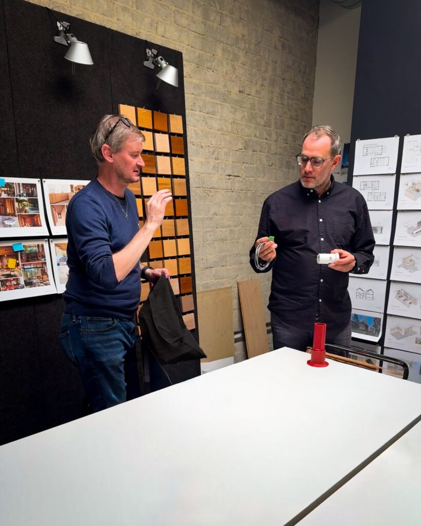 Francesco showing off Messana's mSense room comfort sensor during a Messana Lunch N' Learn. mSense room comfort sensors monitor operative temperature, relative humidity, and volatile organic compounds (IAQ). This allows the system to always monitor the dew-point temperature of an environment.